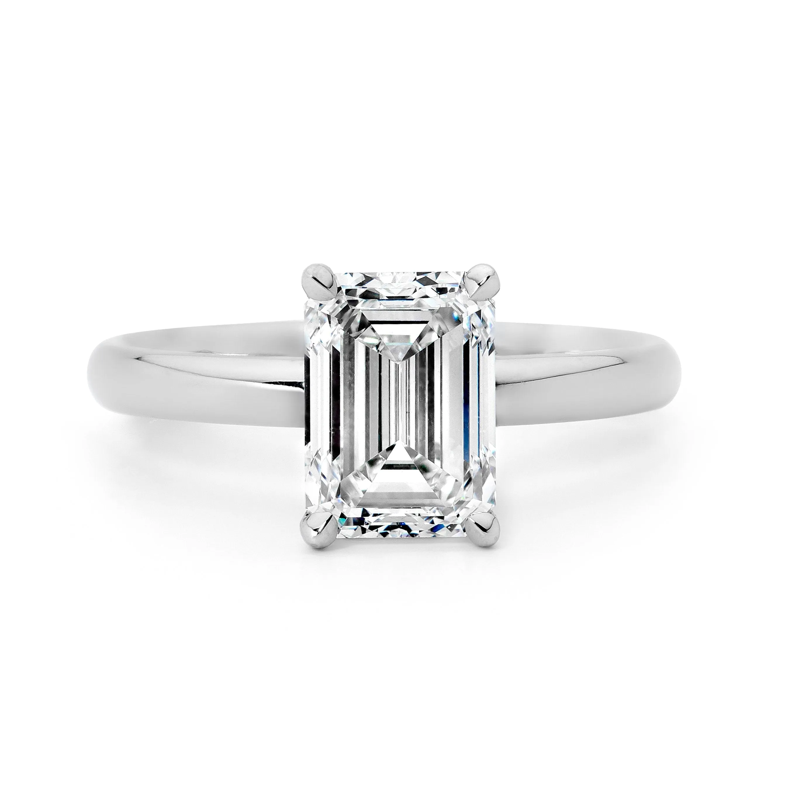 Solitaire emerald cut engagement ring